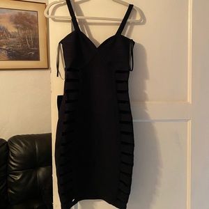 Brand new Bebe mini dress-see through on the side